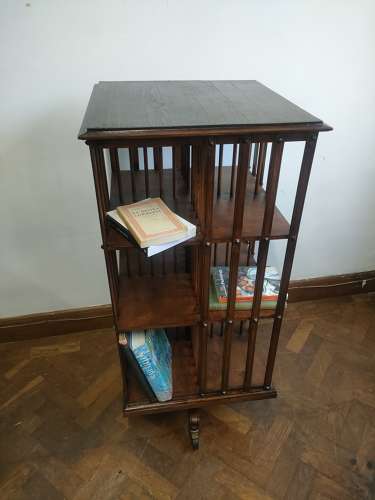 Large oak revolving bookcase by G.Pozzi in Geneva, Switzerland.