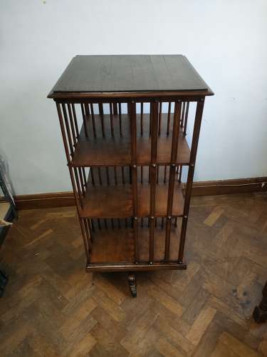 Large oak revolving bookcase by G.Pozzi in Geneva, Switzerland.