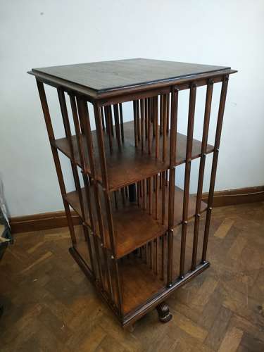 Large oak revolving bookcase by G.Pozzi in Geneva, Switzerland.