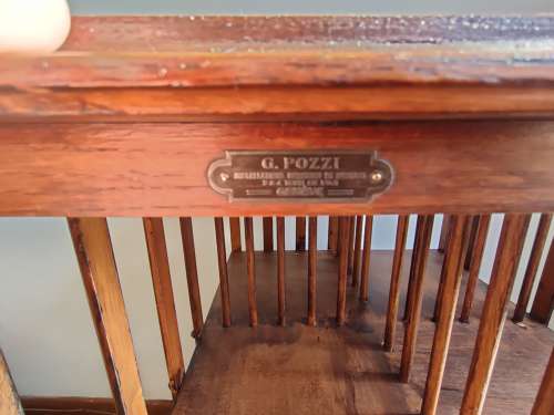 Large oak revolving bookcase by G.Pozzi in Geneva, Switzerland.
