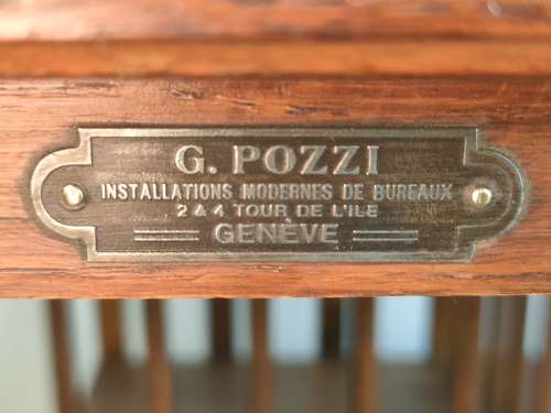 Large oak revolving bookcase by G.Pozzi in Geneva, Switzerland.